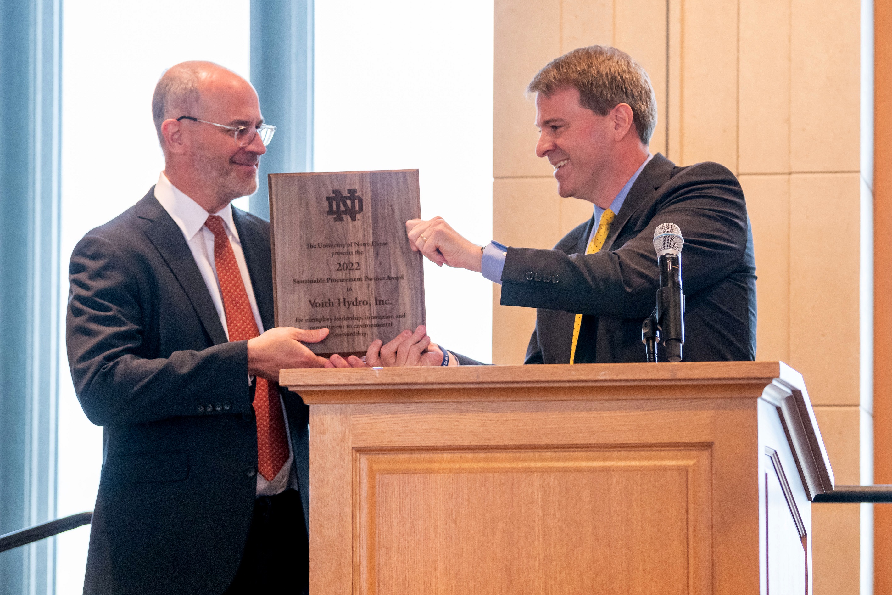 Voith Hydro North America has been awarded the University of Notre Dame Procurement Partner Sustainability Award for the exemplary innovations, products, and services it contributed to the Notre Dame Hydro project. (Pictured from left to right: Stanley Kocon, President & CEO, Voith Hydro North America and Shannon Cullinan, Executive Vice President of the University of Notre Dame.) Photo credit: Barbara Johnston/University of Notre Dame